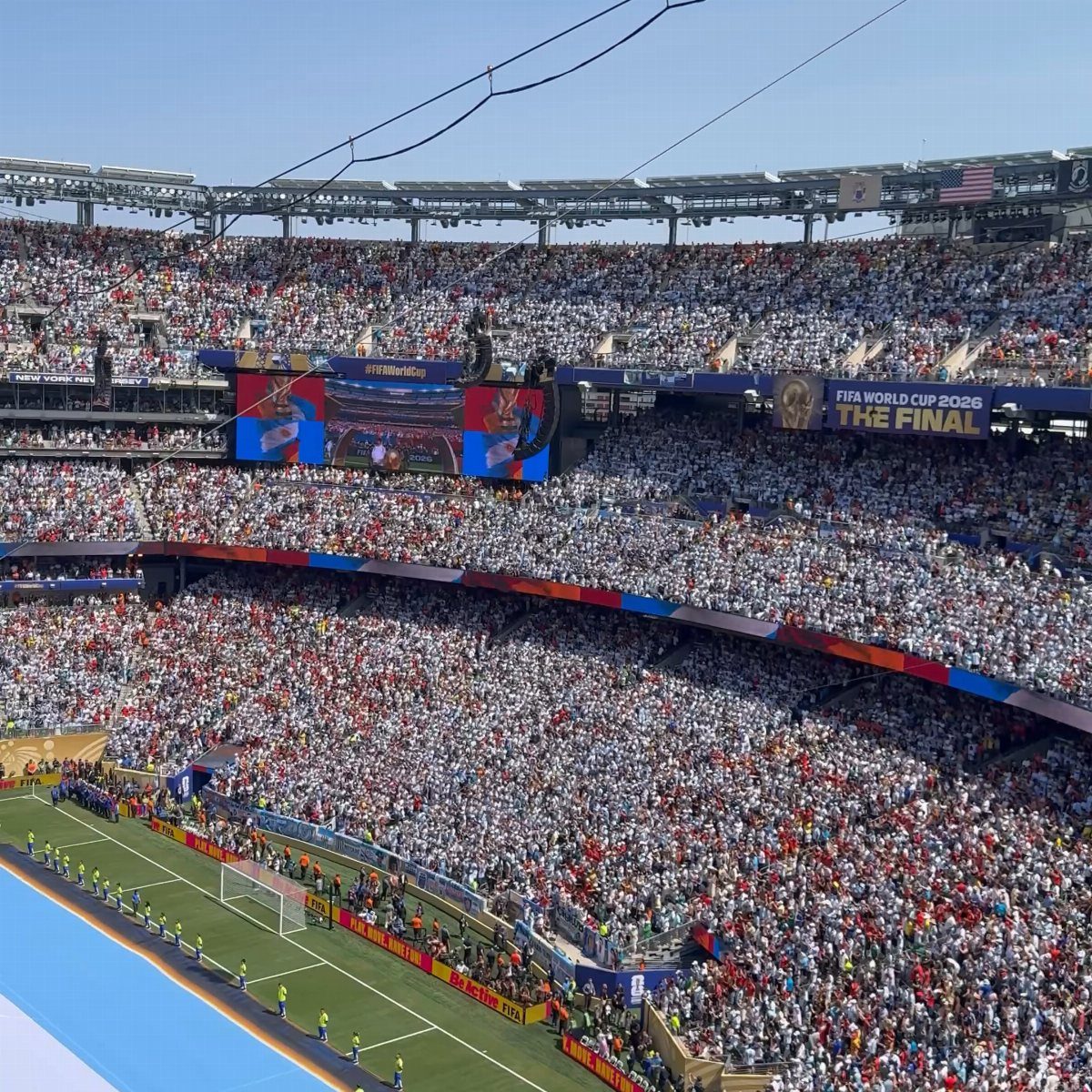 A crowded soccer stadium filled with spectators during the FIFA World Cup final.