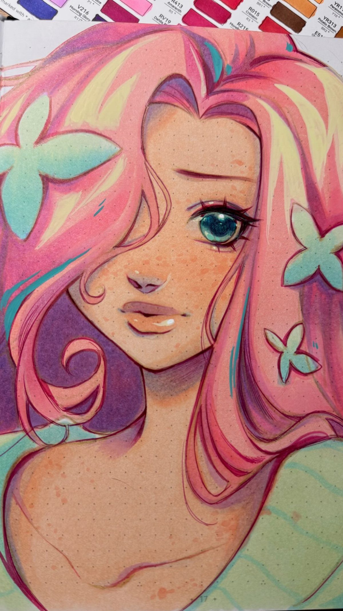 A colorful illustration of a girl with pink hair and blue butterflies, with color swatches at the top.