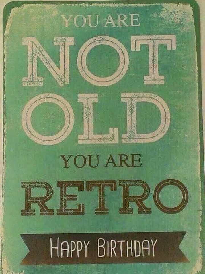 A teal vintage-style sign reading You Are Not Old You Are Retro Happy Birthday.