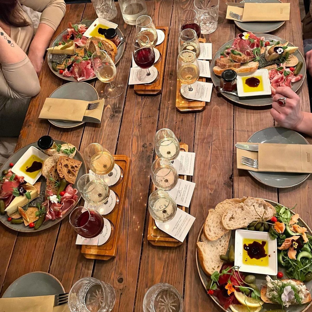 A table filled with assorted food and drinks, perfect for a culinary adventure.
